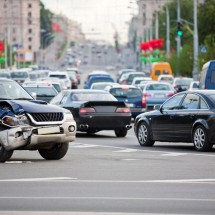 car got in an accident on the background of a large traffic jam