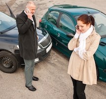 Woman and man on phone car crash