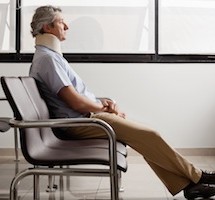Man With Neck Injury Waiting In Lobby