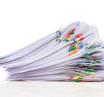 Pile of paper with colorful clips