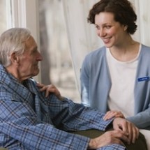 nursing-home-caregiver-with-patient